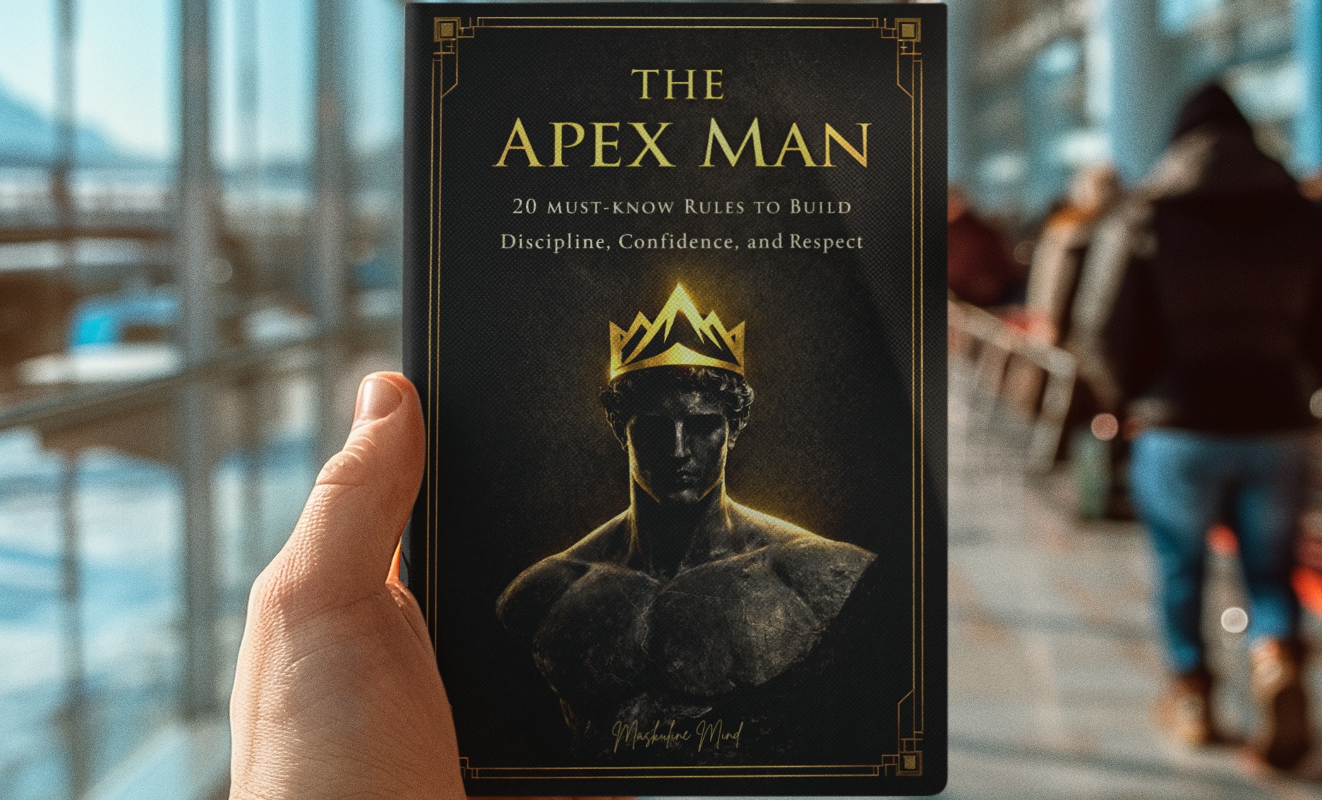 Hand holding 'The Apex Man' book in a modern indoor setting